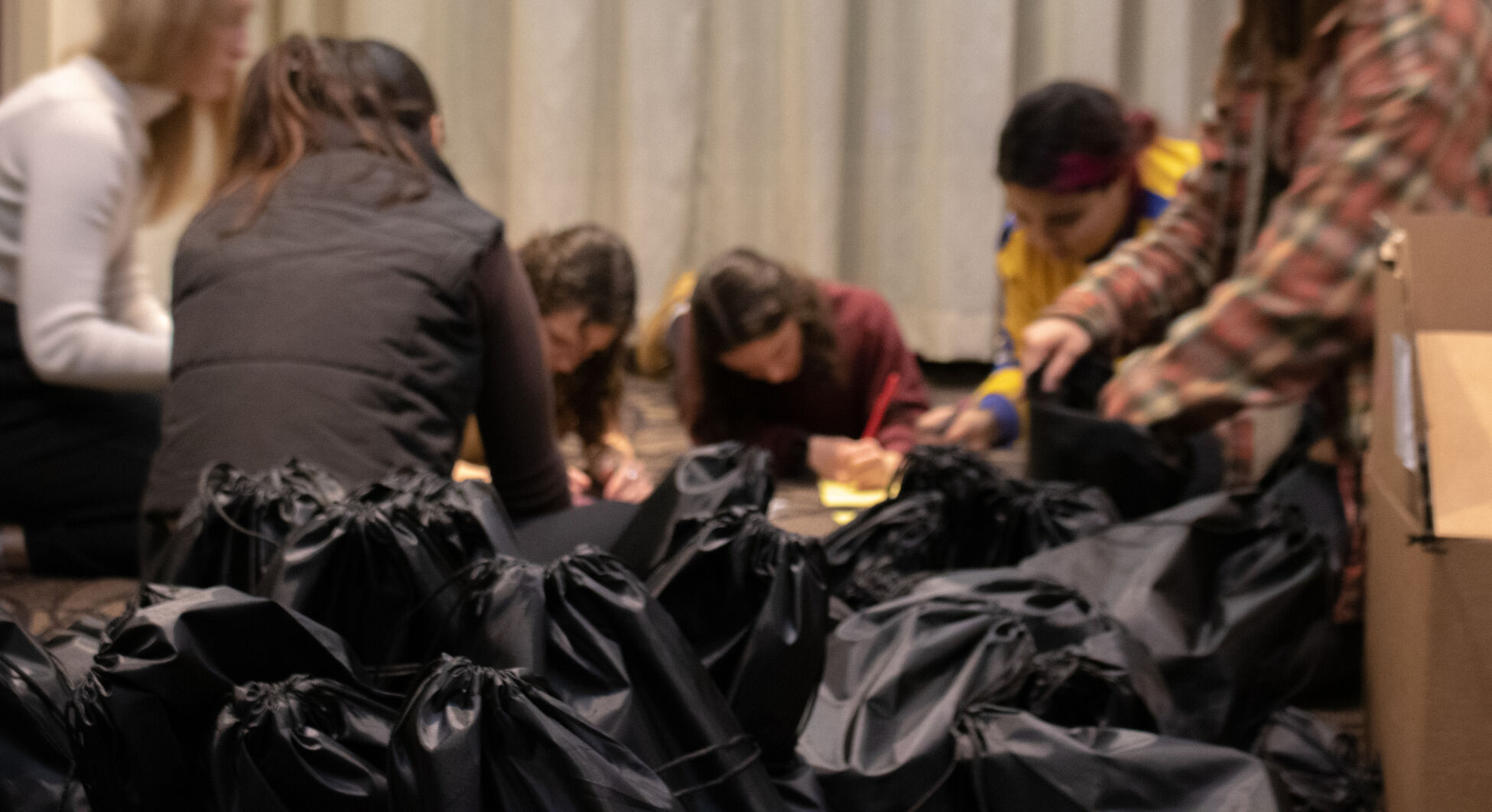 Students prepare care packages at Hats for Hope
